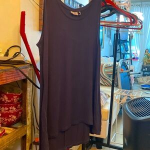 A dark blue logo layers by Laurie Goldstein